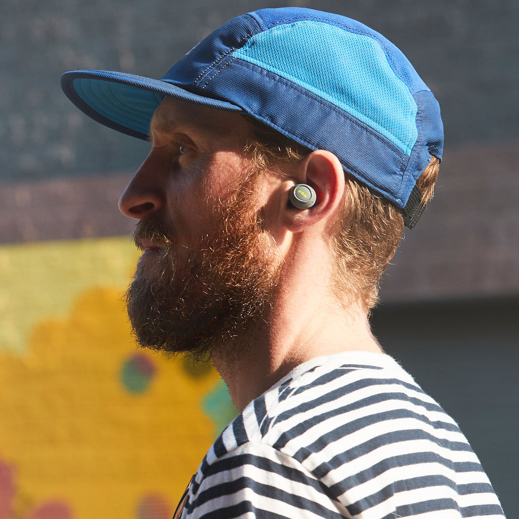 Close up of man wearing Jam Audio Live Free Truly Wireless Earphones Grey 
