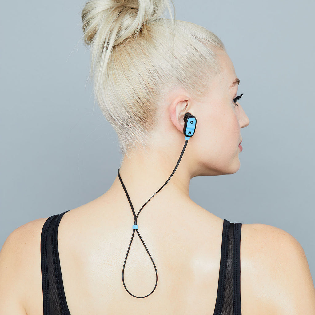 Back of woman's neck wearing Jam Audio Live Large Wireless Bluetooth® Black Earbuds