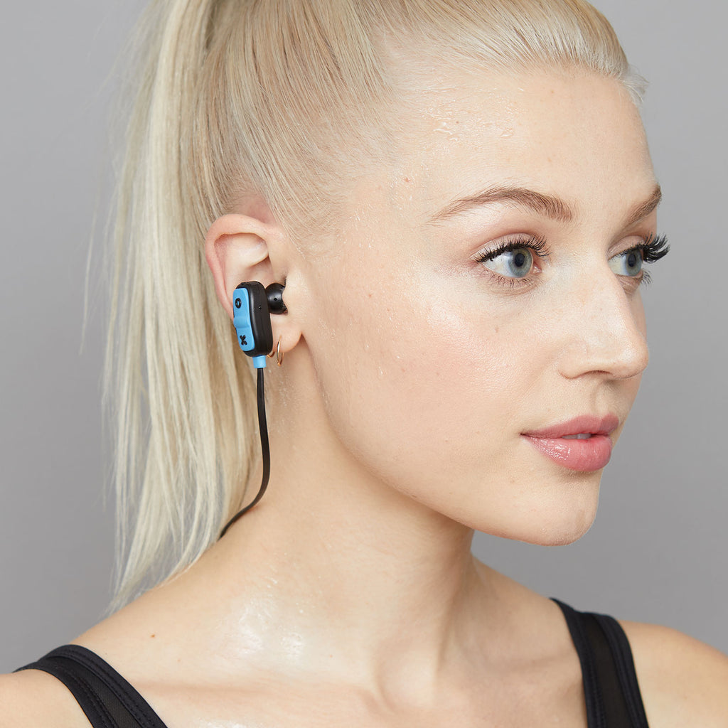 Woman wearing Jam Audio Live Large Wireless Bluetooth® Black Earbuds closeup